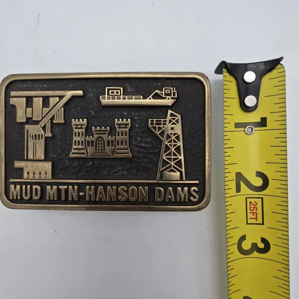 Vintage 1989 Mud Mountain Hanson Dams Solid Brass Belt Buckle USA